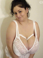 Big-titted chick in a lace body teasing - Picture 2