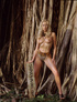 Naughty classy blonde with insanely fit body exposing herself outdoor.