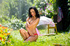 Naughty brunette picking wild flowers takes time for foam bath and stripping