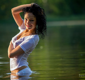Pretty chick takes a dip in lake to cool her spicy hot sexy body and sweet