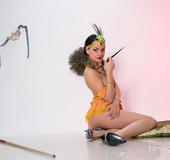Extra cute brunette dressed as medieval princess looks real seductive