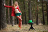 Sexy blonde chick in spicy red strips to model her cute inviting tits