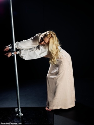 Young blonde chained and tied to pole ha - Picture 6