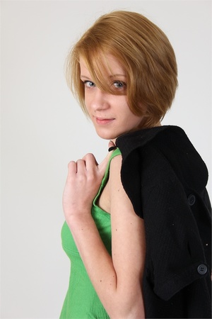 Short-haired slim teen undresses on came - Picture 2