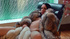 Brunette slut in silver fox coat rubbing her juice twat