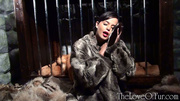 Dirty brunette babe encage with lots of various fur coats