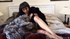 Swarthy babe in a black fur coat toying herself with a vibro