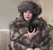 Seductive brunette MILF in silver fox coat and hat