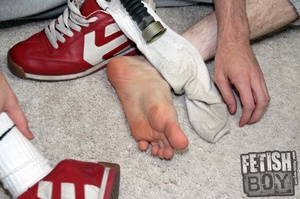 Dirty gay pumping his cocks after sniffing his shoes - Picture 1