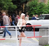 Blonde hot beauty exposing her stunning boobs in public.
