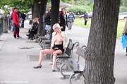 Horny blonde exposing her lusciously formed big boobs in public.