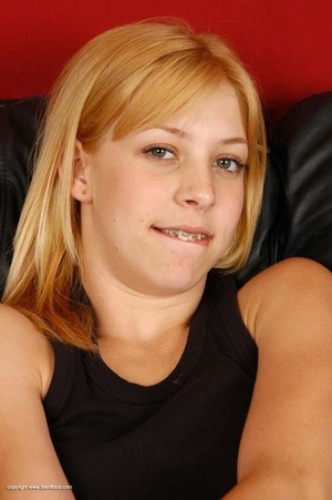 Small-titted blonde tee with braces stretches her pussy - Picture 2