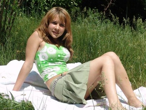 Busty blonde teen chick shows off her hairy pussy outdoors - Picture 5