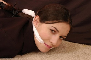 Ponytailed brunette teen gagged and roped tightly - Picture 2
