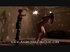 Bound and suspended Asian chick getting flogged and fucked with a strapon