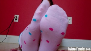 This cute sexy and slutty blackhaired teen teasing with her hot little pink socks and cute feets - Picture 3