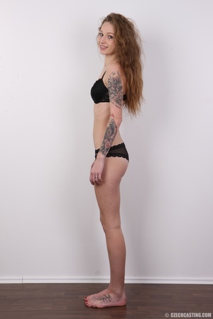 Young tattooed cute seductress shows cut - Picture 8
