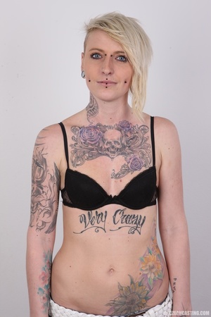 Wild blonde with multiple tattoos and pi - Picture 6