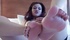 Girl in gold top and undies wants to stroke your cock with her ebony feet