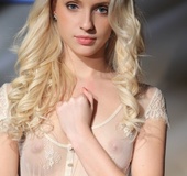 Gorgeous young blonde reveals her naked tight body and sweet coochie