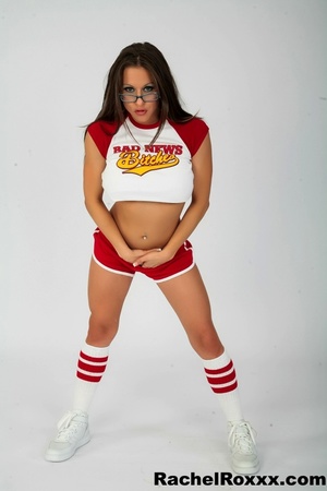 Hot seductress in hot cheerleader outfit and glasses shows hot butt and curves - XXXonXXX - Pic 14