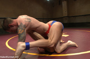 Bald dude and tattooed guy wrestle to determine who sucks cock and gets fucked