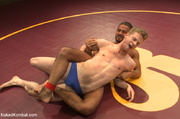 Cute white guy suppressed on wrestling floor made to suck cock and take it in ass