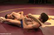 Hard wrestling as two dudes sweat out with cock grabbing, sucking and ass fuck
