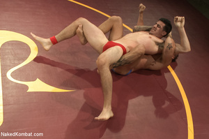Two tattooed studs wrestle and grope eac - Picture 1