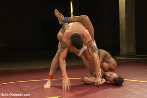 Two tattooed studs wrestle and grope eac - Picture 3