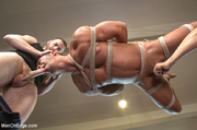 Stud tied with rope and hung sucks cock and gets his ass fucked with machine