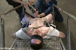 Tattooed guy strapped down to get his co - Picture 3