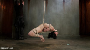 Guy chokes girl tied up with ropes and g - Picture 1