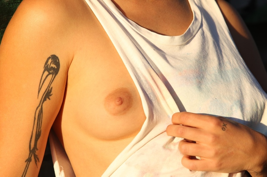 Blonde on bike gives a peep of sexy small t - XXX Dessert - Picture 2