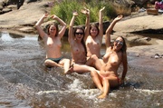 Four adorable babes soak their sexy booties in the river and dry out on the rocks