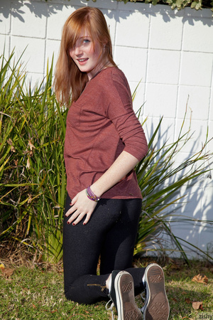 Cute ginger teen in a brown blouse and s - Picture 4