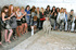 All girls getting excited watching a cool fighting in the mud pool