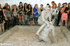 All girls getting excited watching a cool fighting in the mud pool