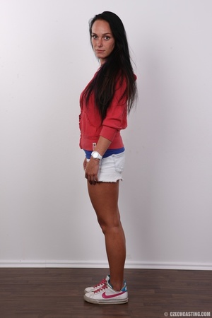 Tanned seductress in sexy shorts strips  - XXX Dessert - Picture 3