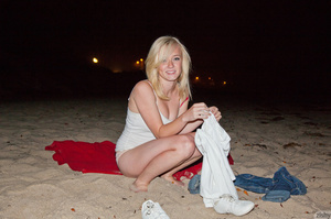 Lovely blonde teen relaxing on the red b - XXX Dessert - Picture 1
