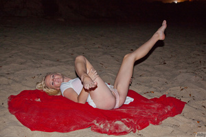 Lovely blonde teen relaxing on the red b - XXX Dessert - Picture 10