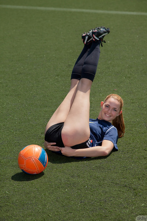 Ponytailed ginger football player trying - Picture 6
