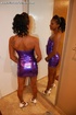 Seductive Indian housewife posing in a glitter purple dress