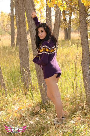 Fun loving beauty out in the woods poses - Picture 5