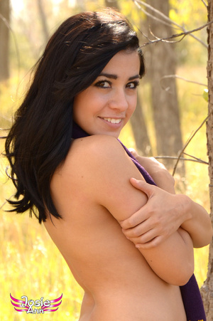 Fun loving beauty out in the woods poses - Picture 13