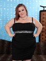 Plump babe in a black dress and - Picture 1