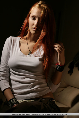 Pierced redhead in a white shirt and fur - Picture 3
