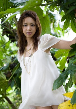 Girl in a white nightie and black underwear does non-nude shots outdoors. - XXXonXXX - Pic 1