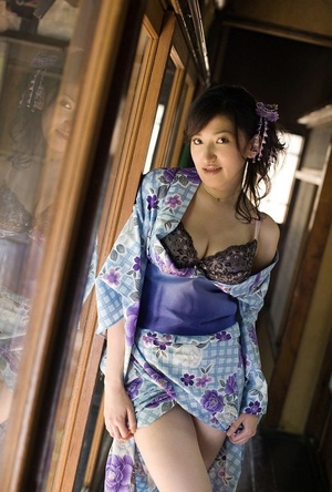 Flirty girl in a kimono and lace underwear flashes in the house. - Picture 4