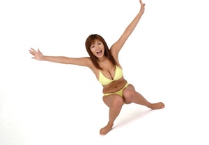 Voluptuous vixen does some sexy poses in her yellow bikini. - XXXonXXX - Pic 10
